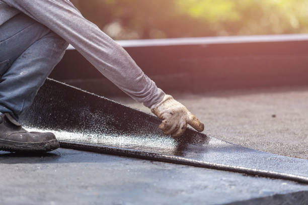 Professional Basement Waterproofing technician working in Eden, WI